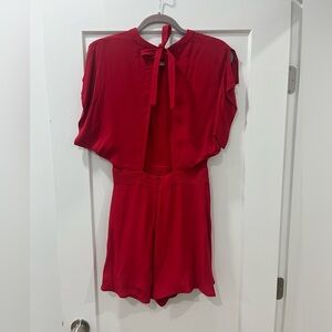 C/MEO Collective Red Romper with open back. Size small.